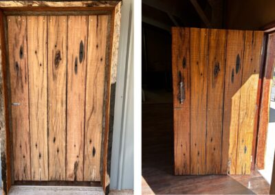 Handmade rustic door made from recycled railway timbers